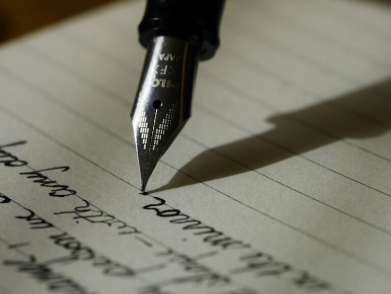 Writing with a pen on paper — illustrative photograph for a literary competition
